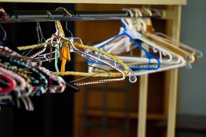 Handmade knitted hanger on a Rack photo