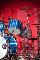 Drumkit in front of Blue Background photo