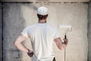 Men Looking at the Painted Wall photo