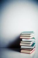 Stack of books on a table photo