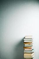 Very high stack of books photo