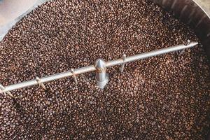 Cylinder mixer with coffee beans photo