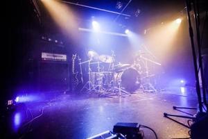 Drumkit on empty stage waiting for musicians photo