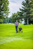 Mature Golfer on a Golf Course photo