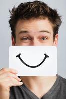 Happy Portrait of Someone Holding a Smiling Mood Board photo