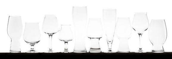 Alignment of All Kind of Beer Glass over White photo