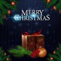 Feliz Navidad, tarjeta de felicitación azul y oscura con ramas de árboles de Navidad y presentes