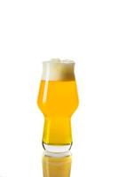 Modern Beer Glass Filled with Blonde NEIPA Yellow Beer in Studio Isolated on White photo