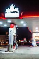 Montreal, Canada December 1, 2017. Petro Canada Commerce and Gas Station Illuminated Late at Night photo