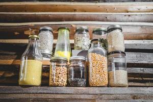 Glass Jars of Spices, Grains and Dry Food photo