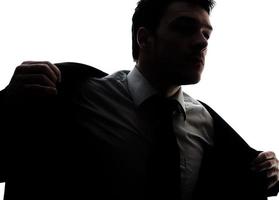 Businessman portrait silhouette getting ready photo