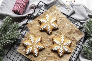 Gingerbread cookies on a metal baking rack photo