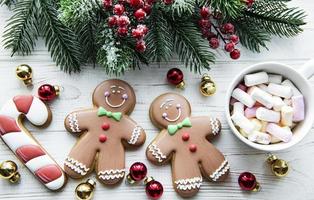 Christmas background with cocoa and gingerbread cookies. photo