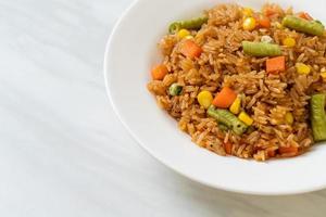 fried rice with green peas, carrot and corn photo