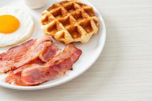 fried egg with bacon and waffle photo