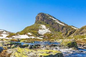 Amazing mountain peak at Veslehodn Veslehorn Hydnefossen waterfall Hemsedal Norway. photo