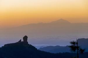 Sunset in the snow mountain, with teide in the background, in gran canaria photo