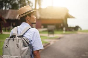 Asian man with bag travel phuket beach Thailand , Phuket sandbox photo