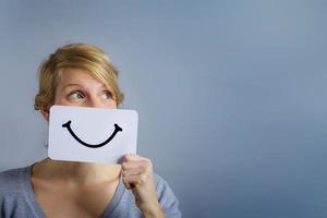 Happy Portrait of Someone Holding a Smiling Mood Board photo