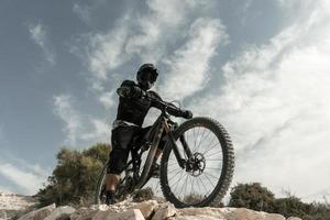 man riding mountain bike low angle. High quality beautiful photo concept