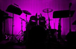 Drum in silhouette with no musician. photo