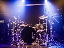 Drumkit on empty stage waiting for musicians
