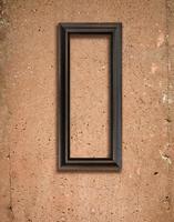 Concrete texture and wooden frame photo