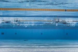 Unrecognizable Professional Swimmers Training photo