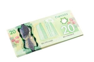 Ottawa, Canada, Avril 13, 2013,  The New Polymer Twenty Dollar Bills isolated on white photo