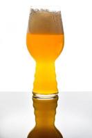 Modern Beer Glass Filled with Blonde NEIPA Yellow Beer in Studio Isolated on White