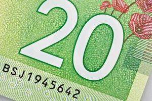 Ottawa, Canadá, 13 de abril de 2013, primer plano extremo de nuevos billetes de veinte dólares de polímero