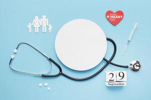 top view world heart day concept with stethoscope photo