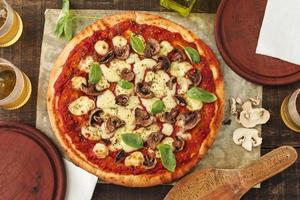 grilled margherita pizza with tomato sauce cheese basil mushroom photo