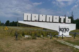 Chernobyl, Ukraine August 8, 2021. Pripyat. Ghost town. Old welcome sign. photo