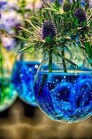 Flowers in blue orbs photo