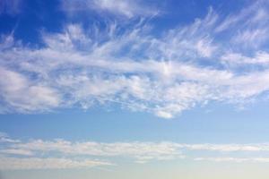 Wispy clouds in sky photo