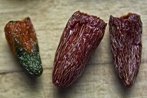 Three Dried Red Peppers photo