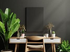 Mockup black frame on work table in living room interior on empty dark wall background. photo