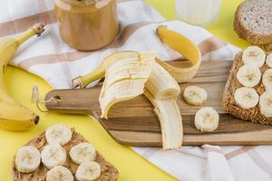 organic banana with peanut butter table photo