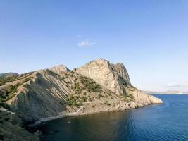 Rocky coast in the Crimea. Sea view photo