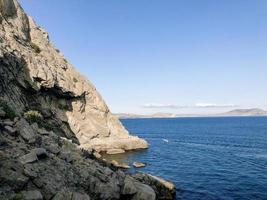 Rocky coast in the Crimea. Sea view photo