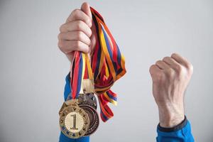 deportista con medallas. deporte, ganador, éxito foto