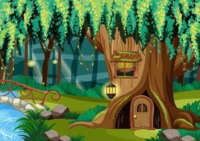 Fantasy forest scene with hollow tree house vector