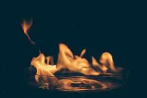 Fondo de llamas de fuego abstracto negro foto