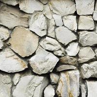Fondo de textura de pared de piedra de grandes rocas antiguas