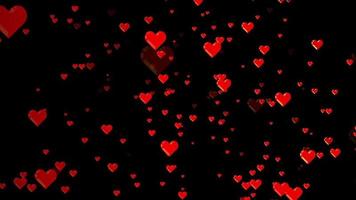 slumpmässigt flygande kärlek hjärta bakgrund animation effekt på svart bakgrund video