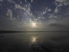 Sunrise on the Bellus reservoir, Spain photo