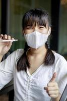 asian woman wearing protection mask