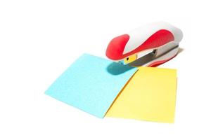 stapler with colorful leaves photo