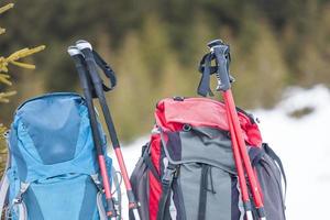 Two backpacks on the snow. photo